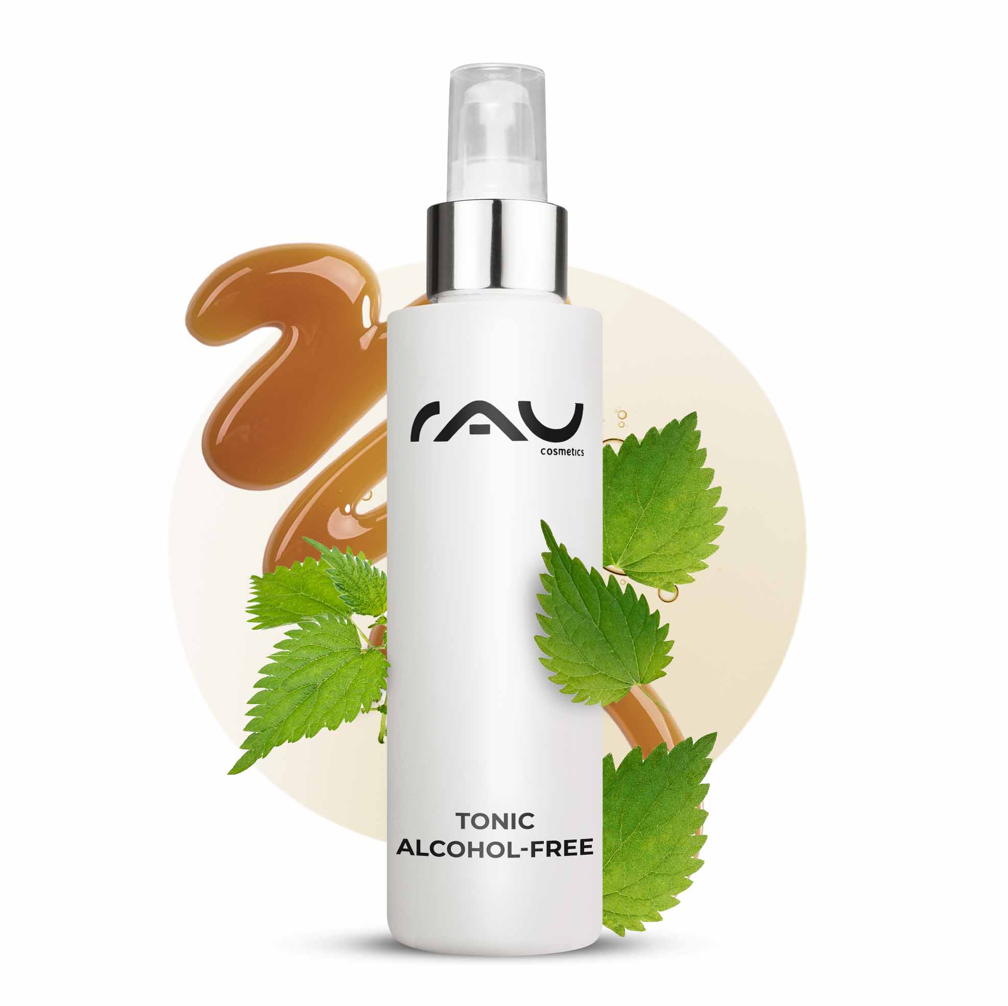 不含酒精的滋补品 200 毫升,含荨麻提取物 Tonic ohne Alkohol von RAU Cosmetics in einer weißen Sprühflasche mit silberner Kappe, mit Brennnesselblättern und einem braunen Flüssigkeitswirbel, der die sanfte und effektive Hautpflege für empfindliche und trockene Haut unterstreicht.